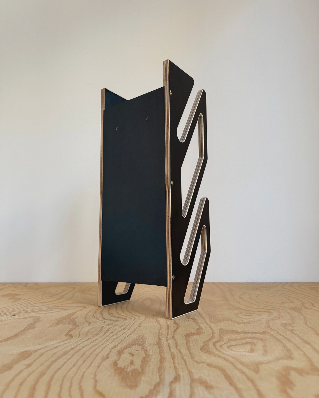 Supporto da parete nero per 2 skateboard