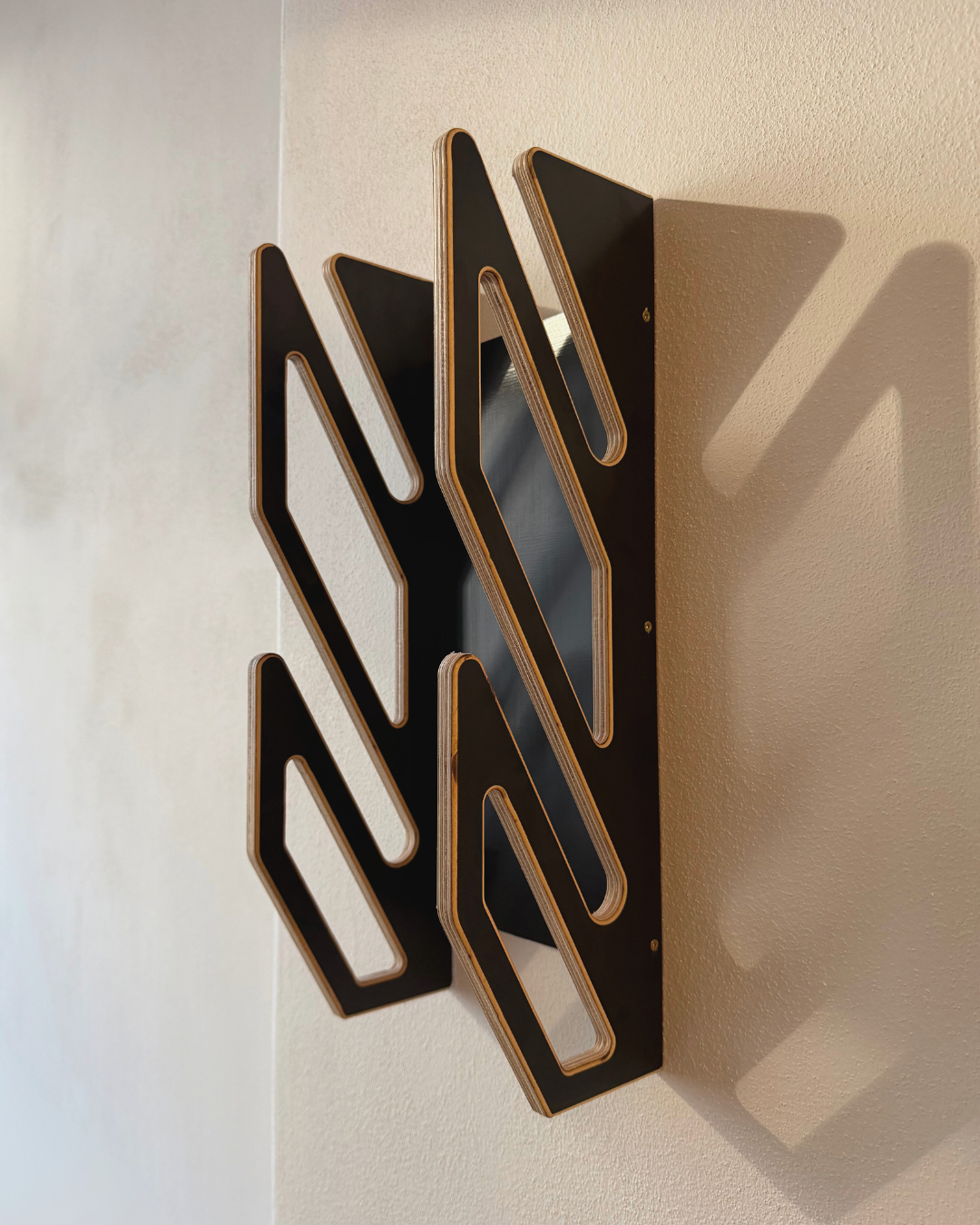 Supporto da parete nero per 2 skateboard