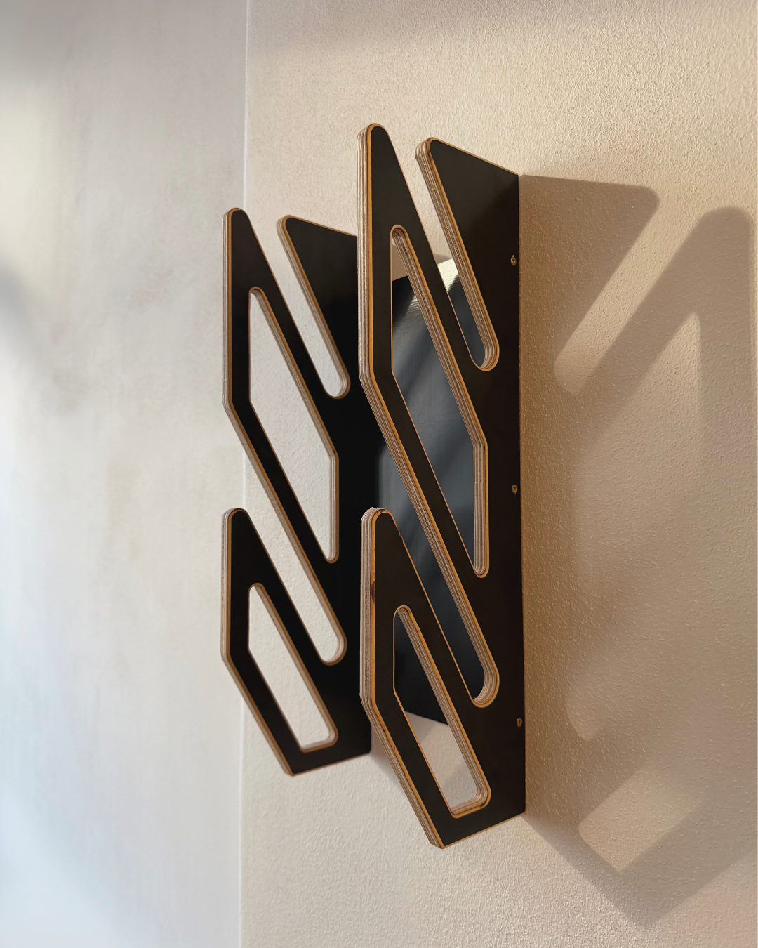 Supporto da parete nero per 2 skateboard