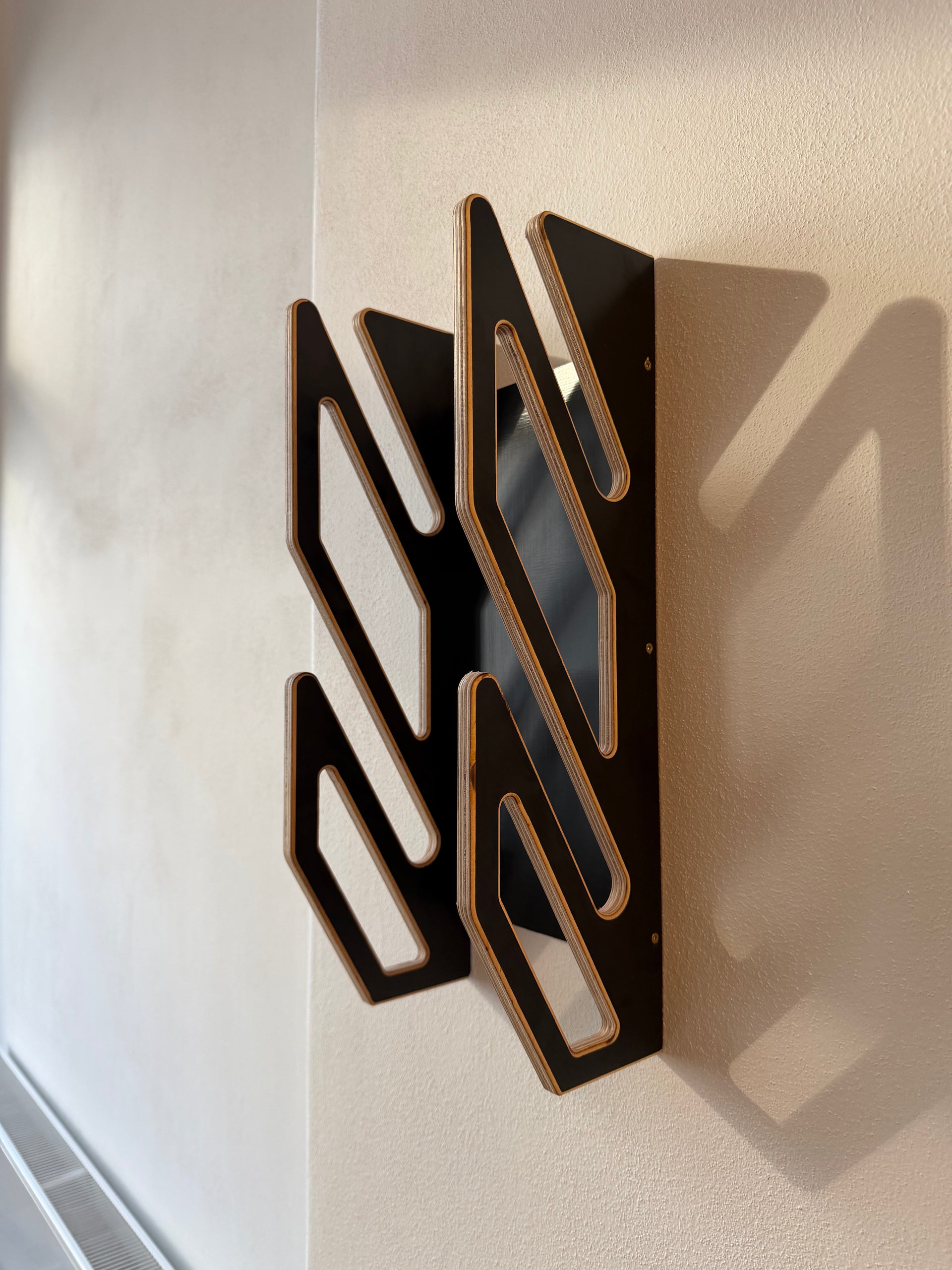 Supporto da parete nero per 2 wakeboard