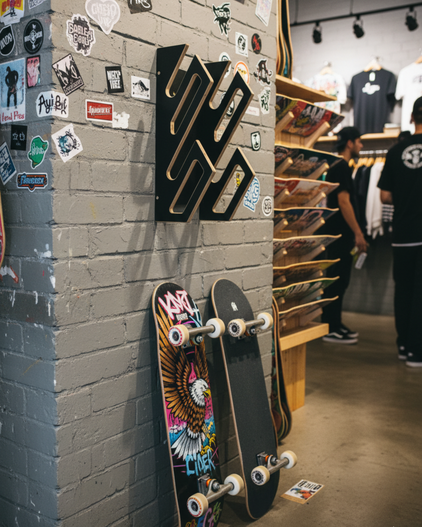 Supporto da parete nero per 2 skateboard